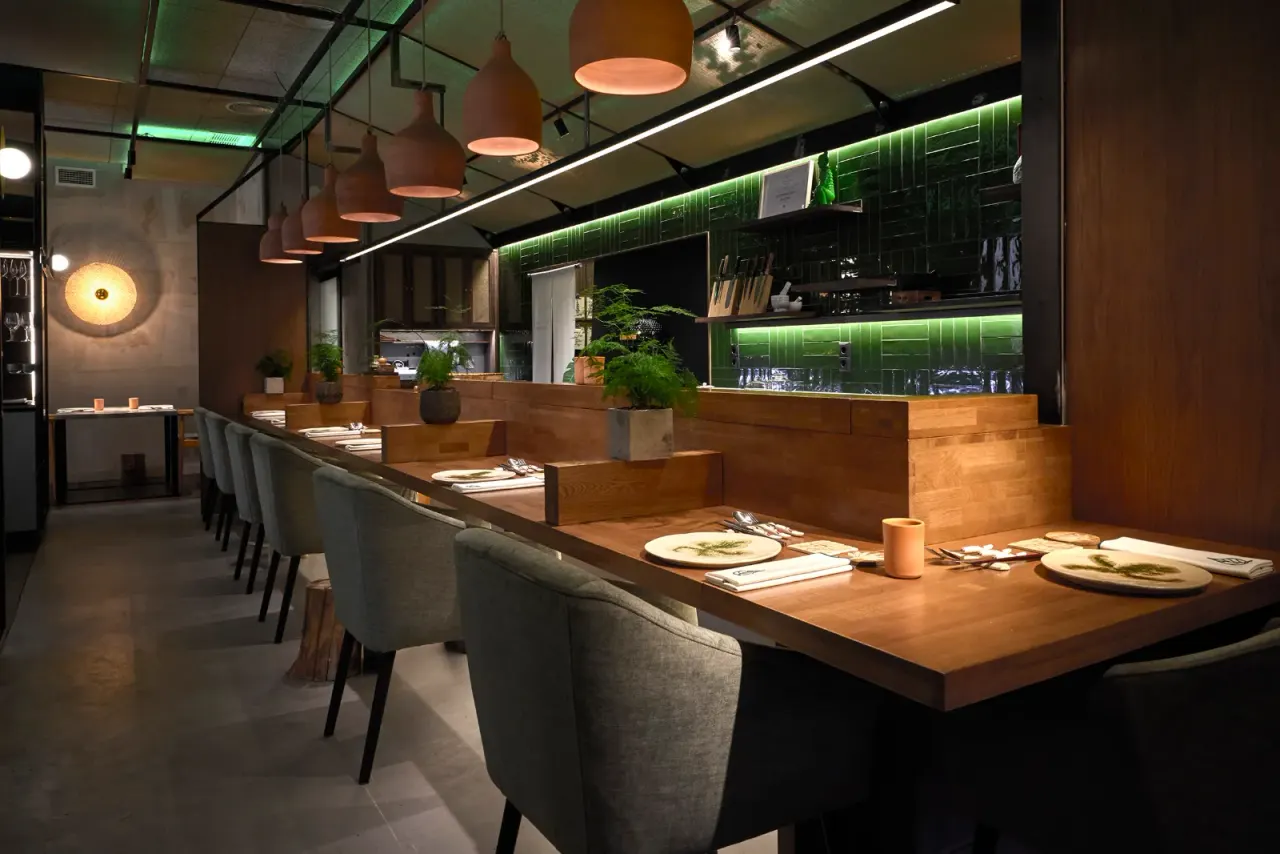 The counter at El Invernadero with the tables set before dinner service