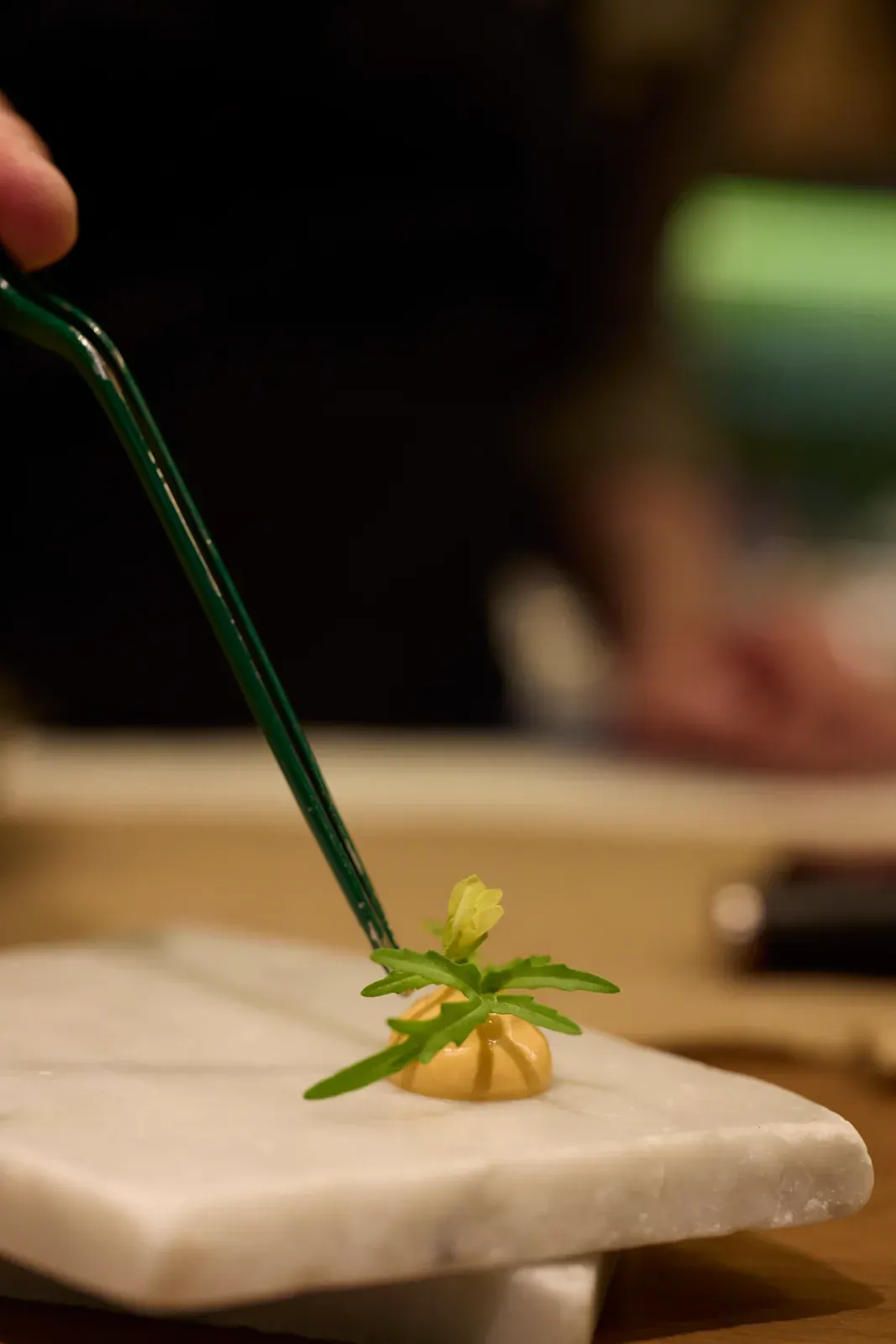 A freshly cut green stem on the work board